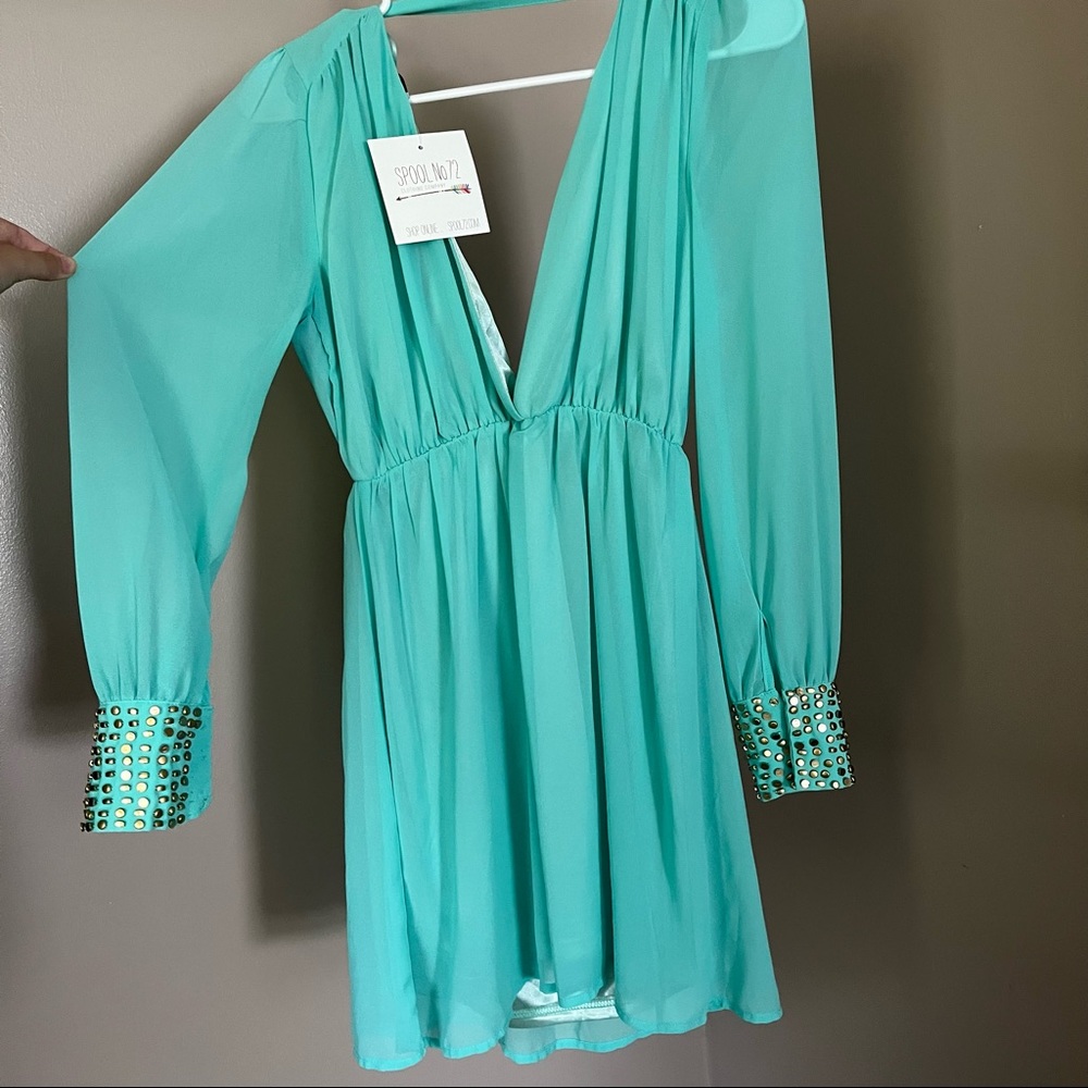 Long sleeve deep v neck dress with gems